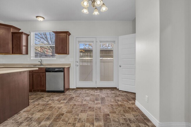 Building Photo - Spacious 4BR End-Unit Townhome | Low-Maintenance HOA Living