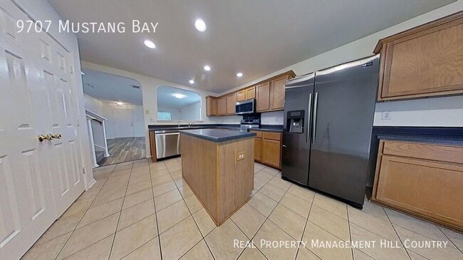 Building Photo - 9707 Mustang Bay