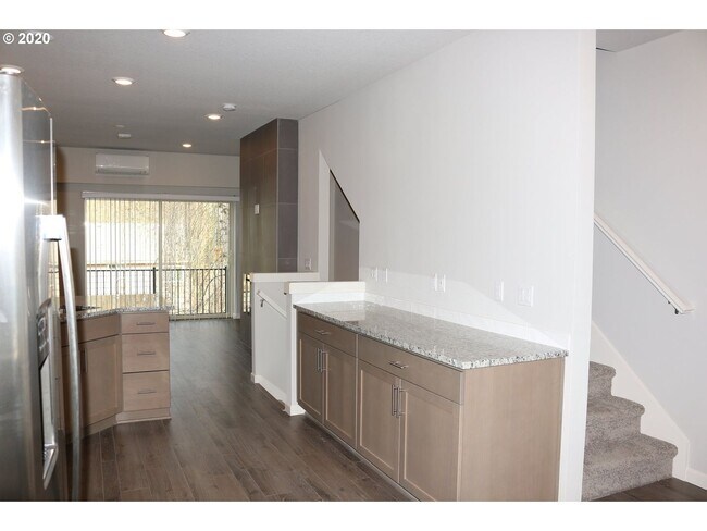 Building Photo - Modern 3-Bedroom Townhome-Style Home with Attached Garage, Private Patio & En-Suite Bathrooms in ...