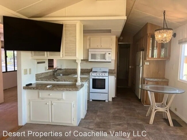 Building Photo - Peaceful Desert Retreat in Gated 55+ Community | Corner Lot with Double Entry Driveway