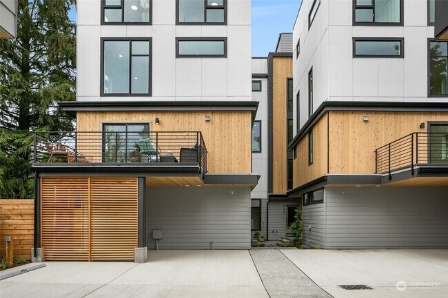 Building Photo - Welcome Home -Modern and Expansive Windows