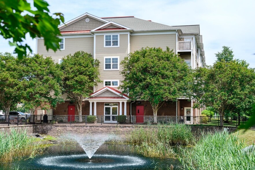 The Promenade Apartments - Building Exterior and Water Feature - The Promenade