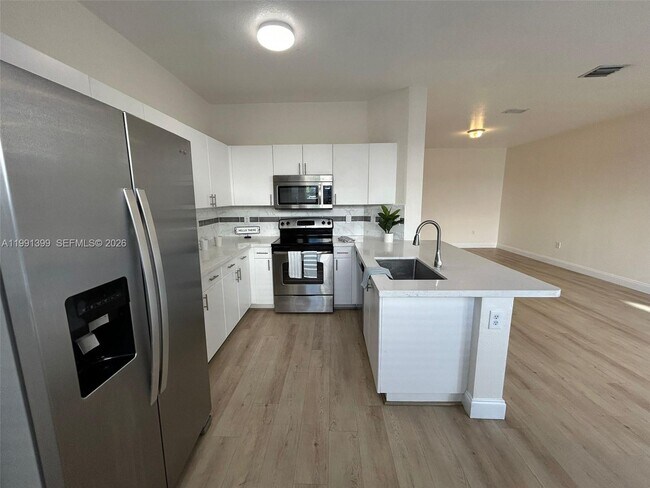 Building Photo - 12515 SW 124th Path