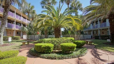 Building Photo - Coastal Condo Living with Pensacola Bay Views, Waterfront Pool Access & Prime Location Near Downt...