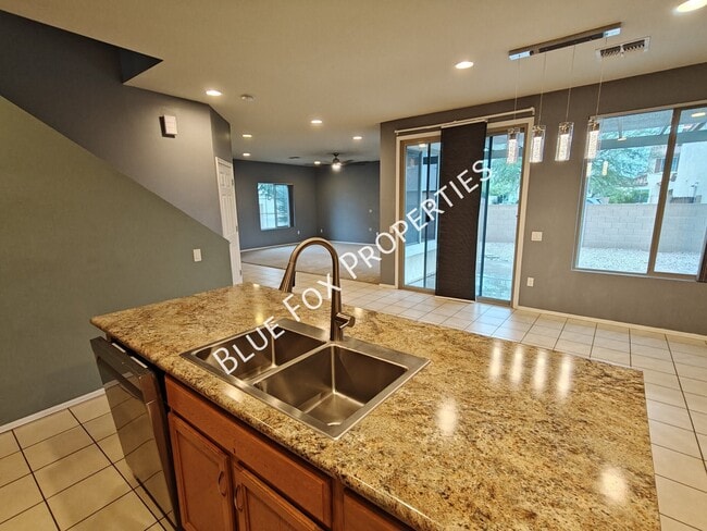 Building Photo - 10947 E Passion Flower Ln