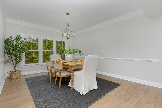 Building Photo - Stylish Renovation with Golf Course Views in a Prime Raleigh Location!