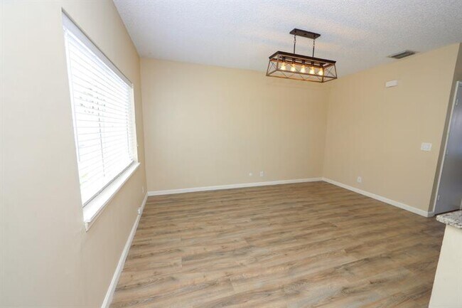 Building Photo - 6006 Plum Isle Way