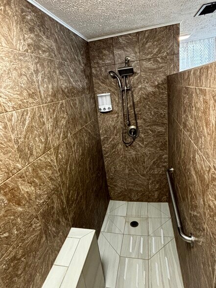 Basement walk-in shower with seat - 815 E 6th St