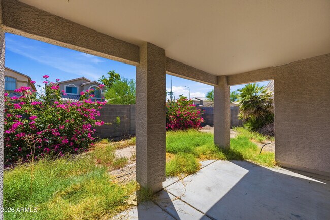 Building Photo - 10469 W Granada Rd