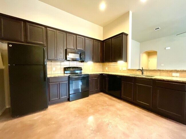 Building Photo - High Ceilings, Fenced Yard & 2-Car Garage – New Braunfels Living!