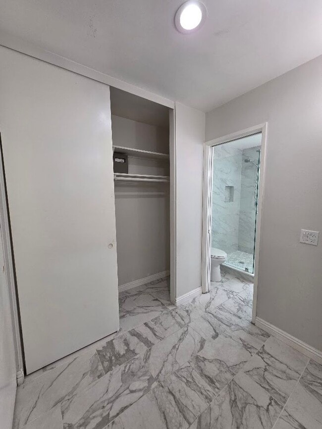 Building Photo - SPACIOUS 4BD/2BA WITH GARAGE, LAUNDRY AND ...