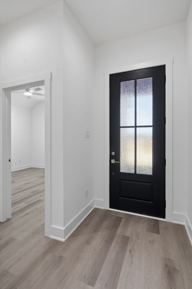 Building Photo - "New Construction 3-2-2 Home with Designer Touches Throughout!"