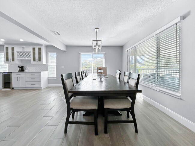 Building Photo - 4 Bed Waterfront Paradise with Pool, Dock & Gulf Access in Baileys Bluff