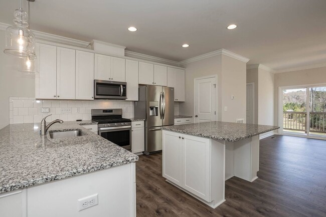 Building Photo - Four Bedroom Townhome!