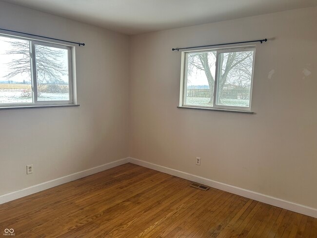 Building Photo - 8667 N Ricks Dr E