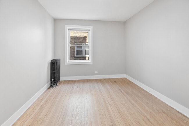 Building Photo - 7375 N Damen Ave