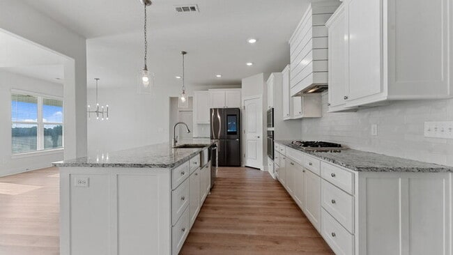 Building Photo - "Lovely 4-Bedroom Retreat with Fireplace &...