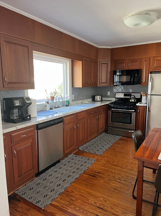 Building Photo - Mature Neighborhood, Modern Conveniences