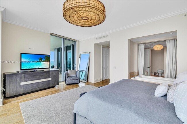 Building Photo - 10295 Collins Ave