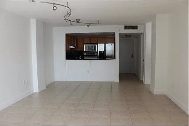 View of the Kitchen from the Living Room - 600 NE 36th St