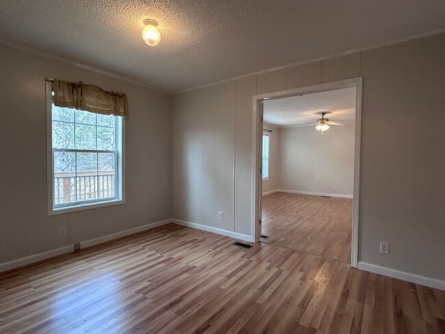 Building Photo - Spacious 3BR Sugar Grove Home with Deck, Fenced Yard & Two Bonus Rooms