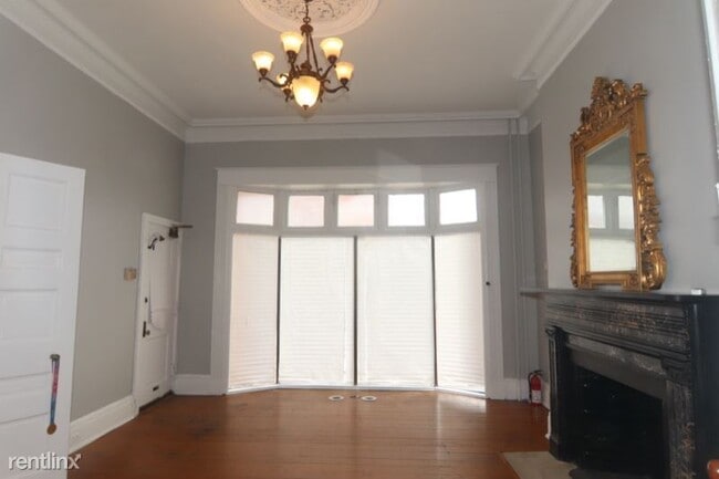 Building Photo - 4 br, 1.5 bath House - 700 N Howard St