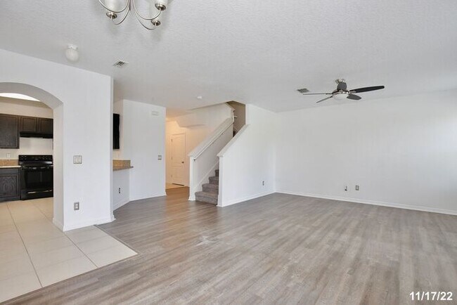 Building Photo - Spacious 3/2.5 Townhome with a 2 Car Garage and a Beautiful Pond View in Westwood Condos - Orlando!