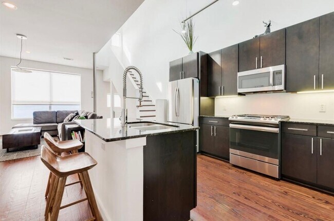 Building Photo - Immaculate 2-Story Urban Loft Townhome wit...