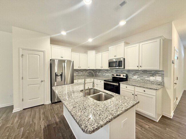 Building Photo - Spacious 3BD, 3.5BA Clayton Townhome with a Large Bonus Space Downstairs and Easy Access to Highways