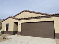 Building Photo - $1,675 rent - Home in gated community with...