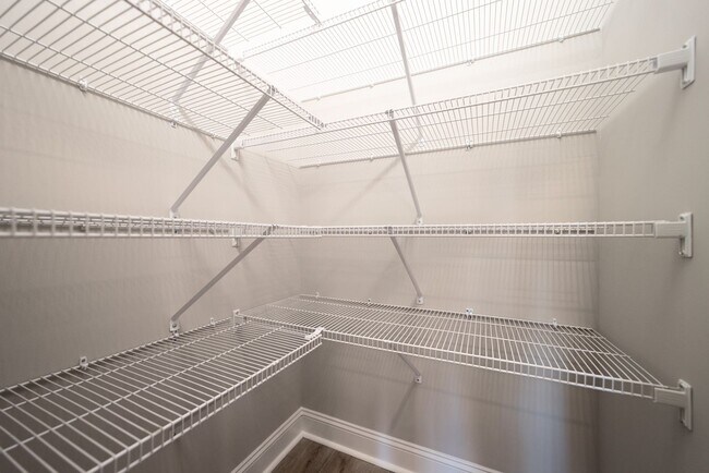 Building Photo - Elegant Home with Stone Fireplace, Kitchen Island and Designer Primary Suite