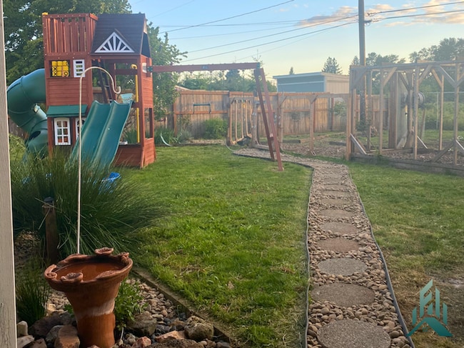 Building Photo - Spacious 3-Bedroom Home with Huge Shop, RV...
