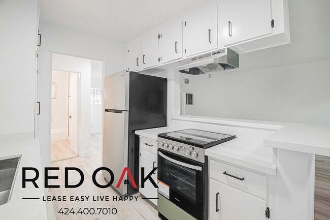 Building Photo - 211 S Ave 57