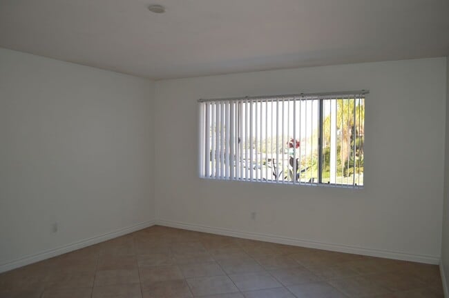 Building Photo - Four Bedroom, Two Bathroom Single Story Home With Two Car Garage