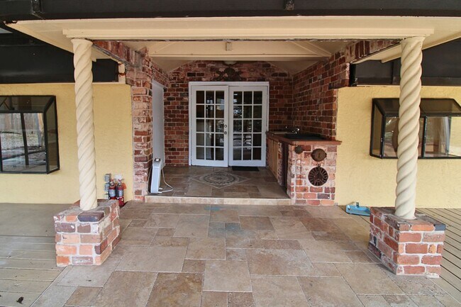 Building Photo - Stunning 3-Bed, 2-Bath Spanish-Inspired Custom Home with Elegant Gardens & Fountains