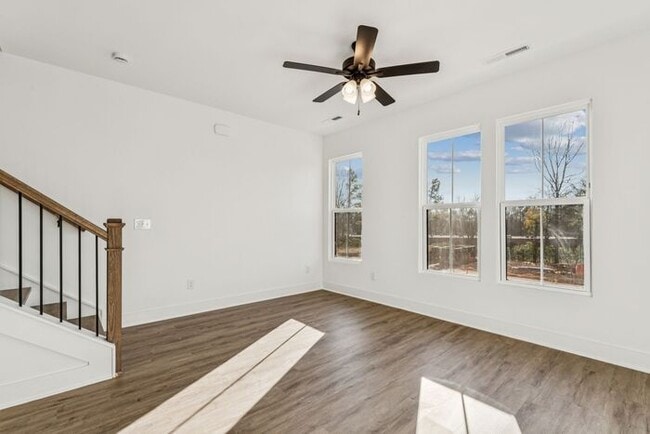 Building Photo - High-End 2BR Townhome | Rooftop Terrace + 2-Car Garage | 24-Unit Community