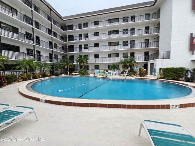 Building Photo - Coastal Paradise Awaits: Elegant 2-Bed, 2-...