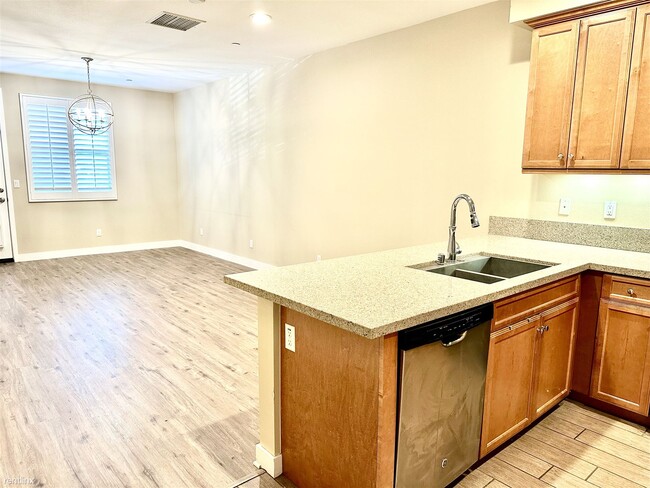 Building Photo - 3 br, 3 bath Condo - 9327 Alondra Boulevard 2