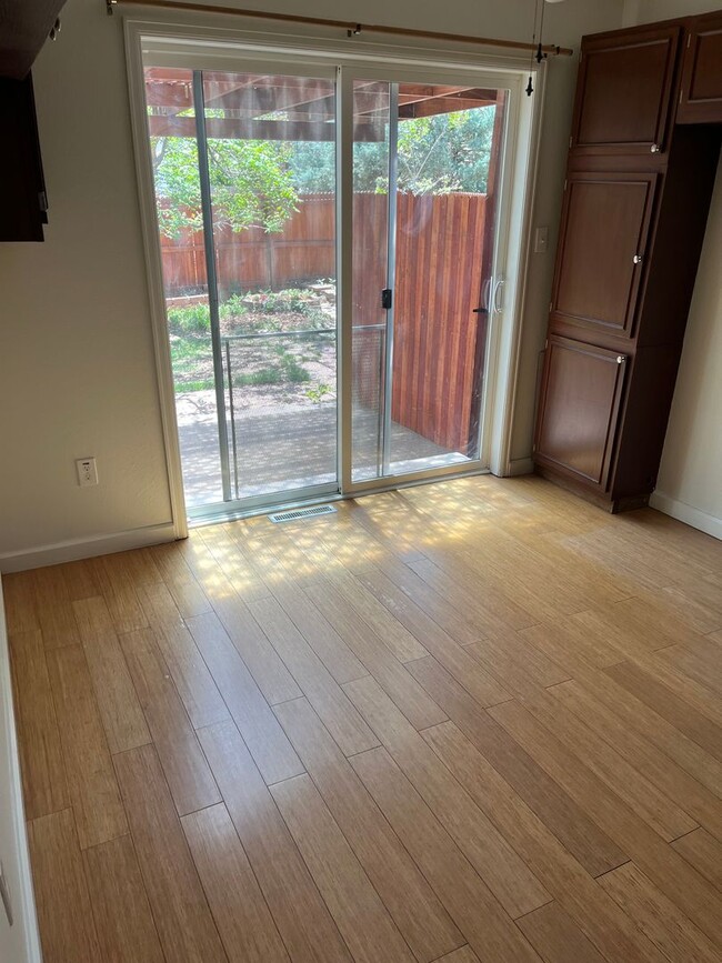 Building Photo - 4 Bedroom Gardener's Delight With Rooftop Patio, Privacy and Covered Parking