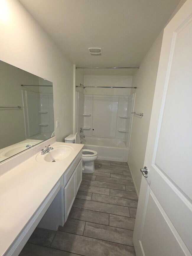 Building Photo - COMING SOON! New 3BR 2 BA Home w/ 2-Car Garage • Stainless Kitchen • Timer-Irrigated Yard in East...