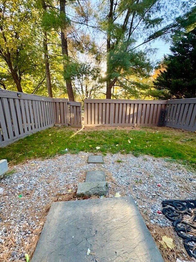 Building Photo - Beautiful end-unit townhome. Walkout basem...