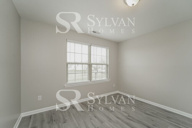 Building Photo - Come view this charming home