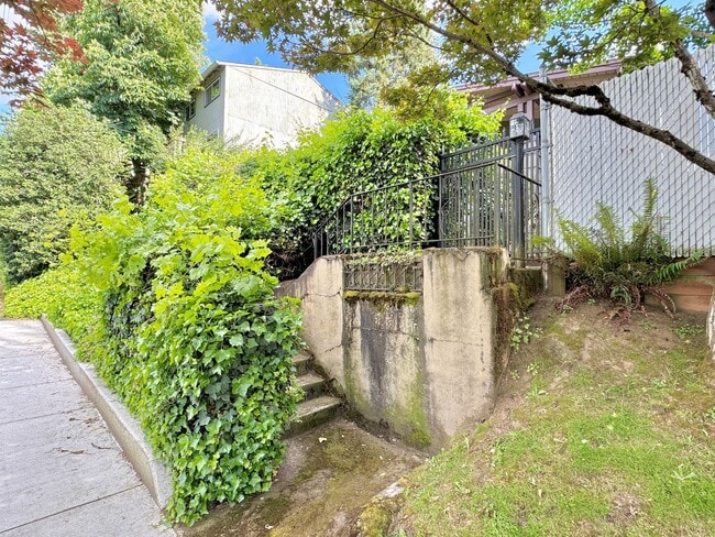 Building Photo - Montavilla Polished 2-Story with Hardwoods, Whole House A/C, Attached Garage, Off-street Parking