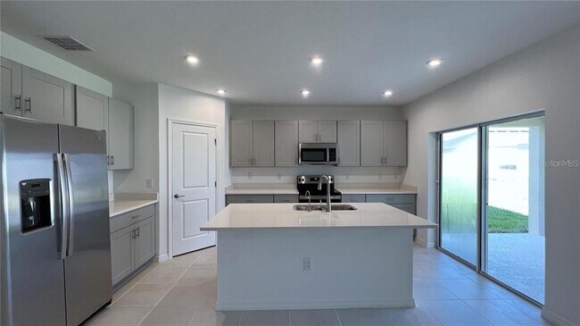Building Photo - 5557 Tranquila Ln