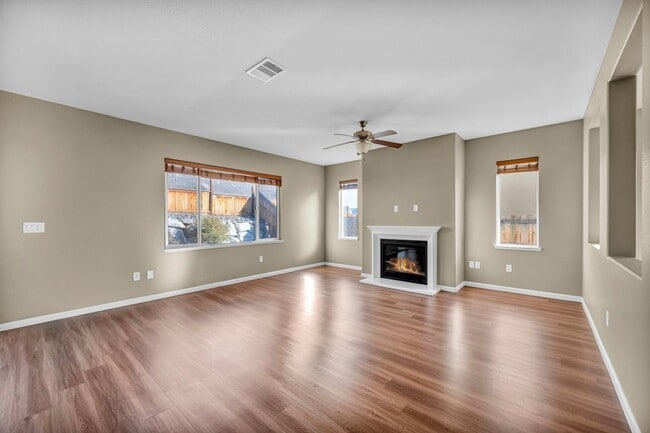 Building Photo - Sun-Filled, Spacious Living with a Three-Car Garage