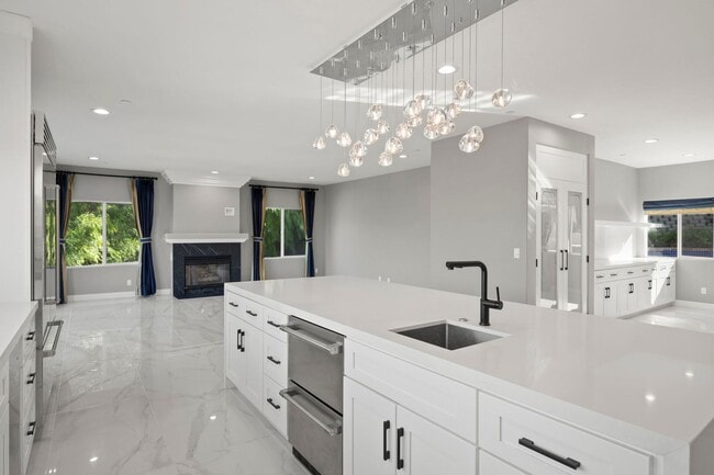 Building Photo - Modern Elegance Meets Scenic Privacy in Be...