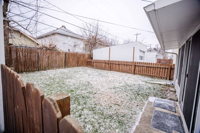 Building Photo - Beautiful two bedroom home with bonus room, fenced in back yard, garage, and full basement!