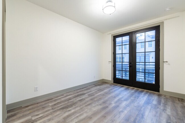 Building Photo - Modern Living Meets Walkable City Charm in...