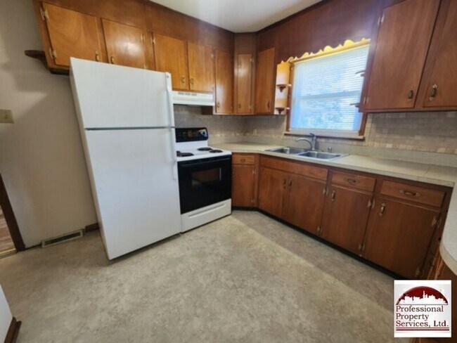 Building Photo - Charming Brick Rancher Offers A Perfect Blend Of Country Living And Convenience