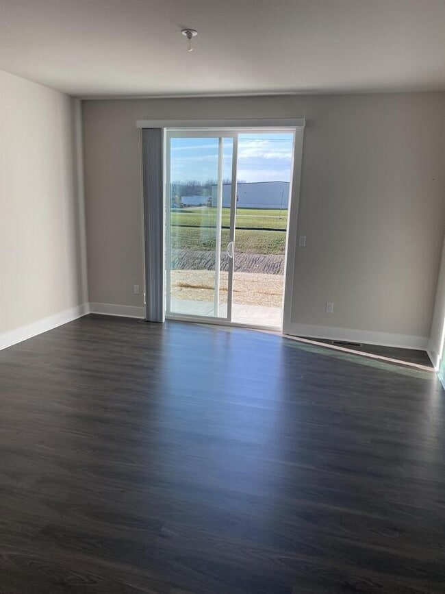 Building Photo - W218N16046 Tiger Lily Dr
